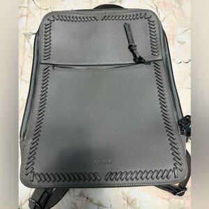 Kaya Calpak Grey 15 inch laptop backpack.